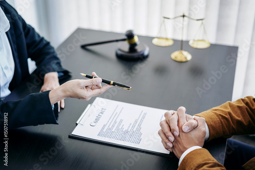 Male lawyer or notary working consulting and discussion to businesswoman client in the office, Law and Legal services concept