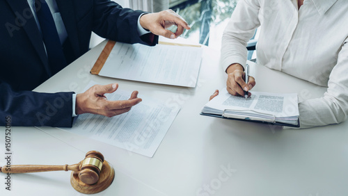 Businesswoman and Male lawyer or judge consult and conference having team meeting with client at law firm in office, Law and Legal services concept