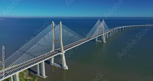 Aerial view of Vasco da Gama bridge crossing the Tagus river in Lisbon, Portugal. Modern design