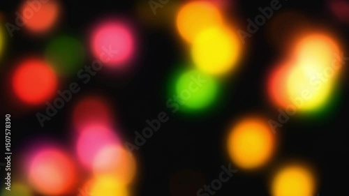 Vibrant Colorful Bokeh Lights Swirling Gently on Dark Background — Soft Glowing Orbs with Smooth Motion, High-Resolution Abstract Video