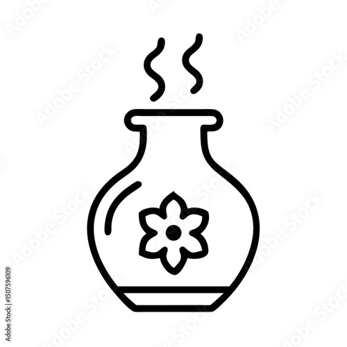 Aromatherapy diffuser with floral design emitting fragrance steam  