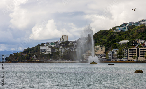 Cityscape of Wellington, the capital city of New Zealand. Carter Memorial Fountain in Oriental Bay beach