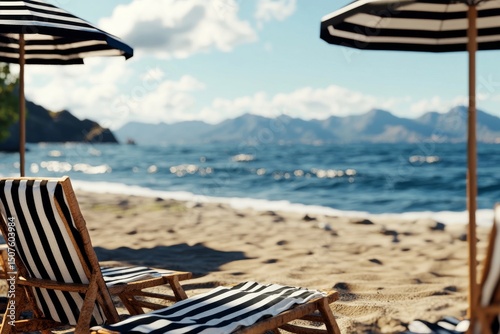 Relaxing Beach Chairs Under Striped Umbrellas Near the Calm Ocean on a Sunny Day