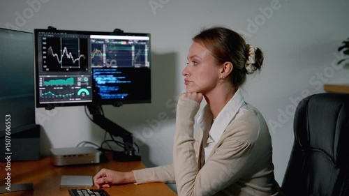 Businessman trading stocks on a computer screen	