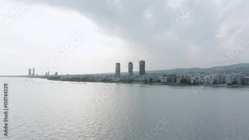 Limassol cityscape featuring modern skyscrapers rising above the Mediterranean Sea