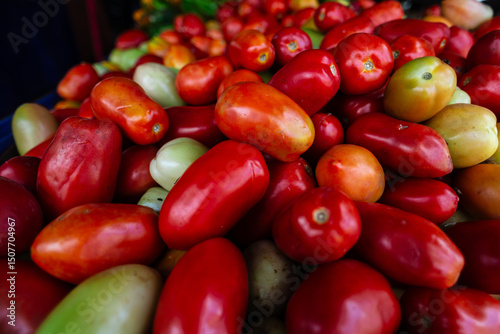 Tomatoes for sale at a street market. Fruit rich in lycopene and contains vitamin C.