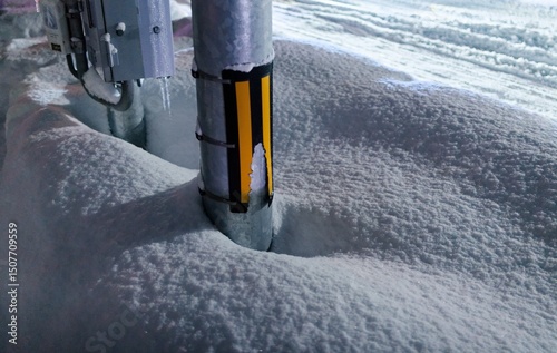 大雪に襲われた街の電柱 photo