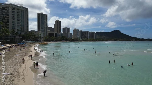 Forward motion drone aerial shot of Waikiki Beach in Oahu