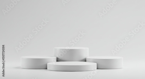 Four white round podiums isolated on white background for product display