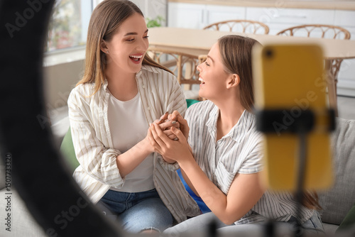 Young lesbian couple record...