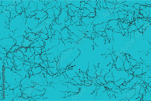 Black cracks covering cyan surface creating distressed texture background
