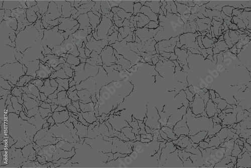 Black cracks covering gray surface creating distressed texture background