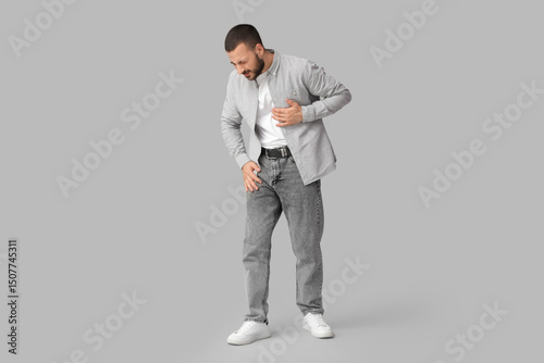 Young man suffering from he...