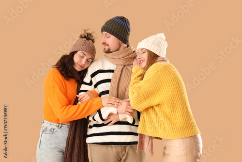 Man and two beautiful women...
