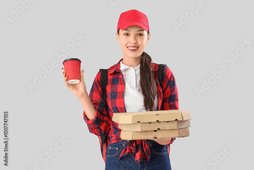 Female Asian courier with p...