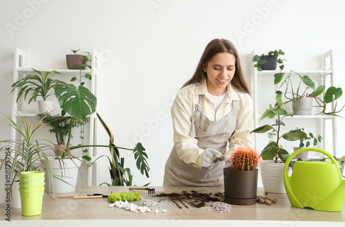 Young woman with gardening ...