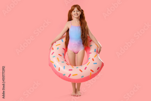 Little redhead girl with in...