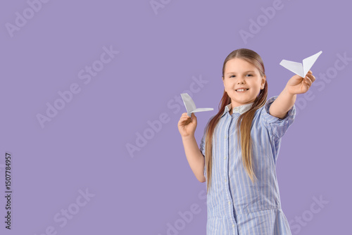 Cute girl with paper planes...