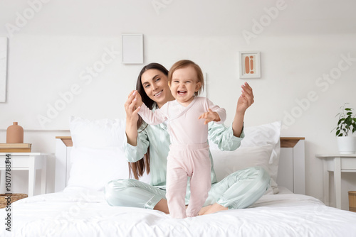 Happy mother with her baby ...