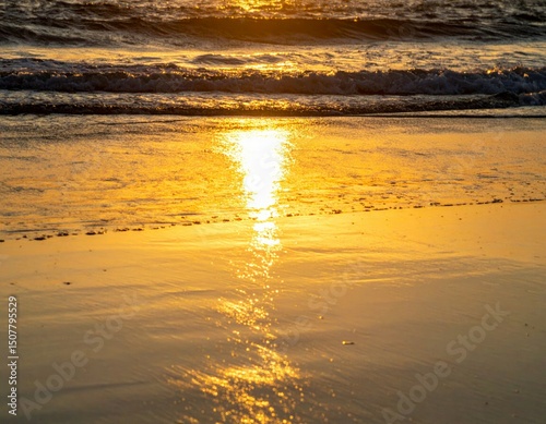 Golden Sunset Reflection on Tranquil Beach Shoreline Water Surface