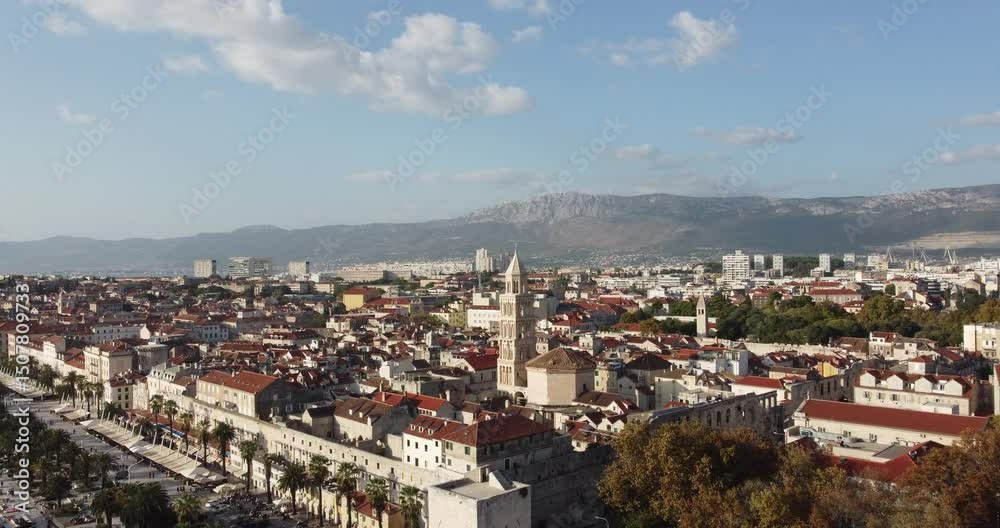 Aerial view of the city of Split, with its medieval and Roman buildings and the Dinaric Mountains, a wooded hill on a sunny summer day full of tranquility, Split, Croatia. Aerial view of the city of Split, with its medieval and Roman buildings and the Dinaric Mountains, a wooded hill on a sunny summer day full of tranquility, Split, Croatia.