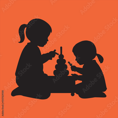 Two girls playing with stacking rings toy silhouette
