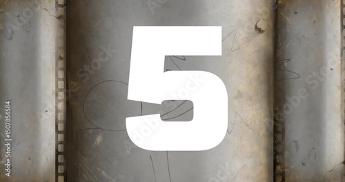 Displaying numeral 10 on rusted panel, countdown dropping per second to 1, light spots drifting