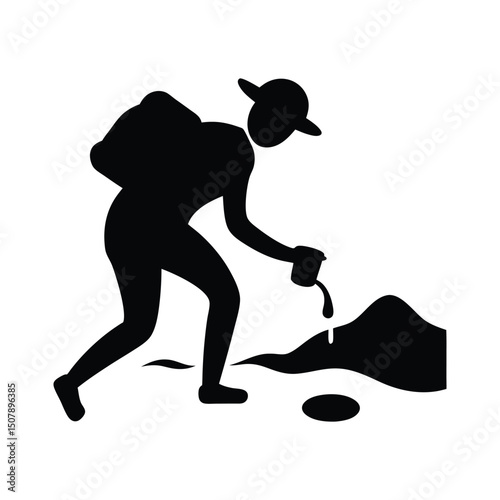 Hiker collecting water from stream black silhouette