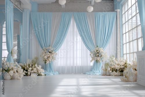 Wallpaper Mural A bright, airy event space features pale blue and white draped fabric backdrops flanking large windows, adorned with abundant white floral arrangements in elegant urns, creating a serene Torontodigital.ca