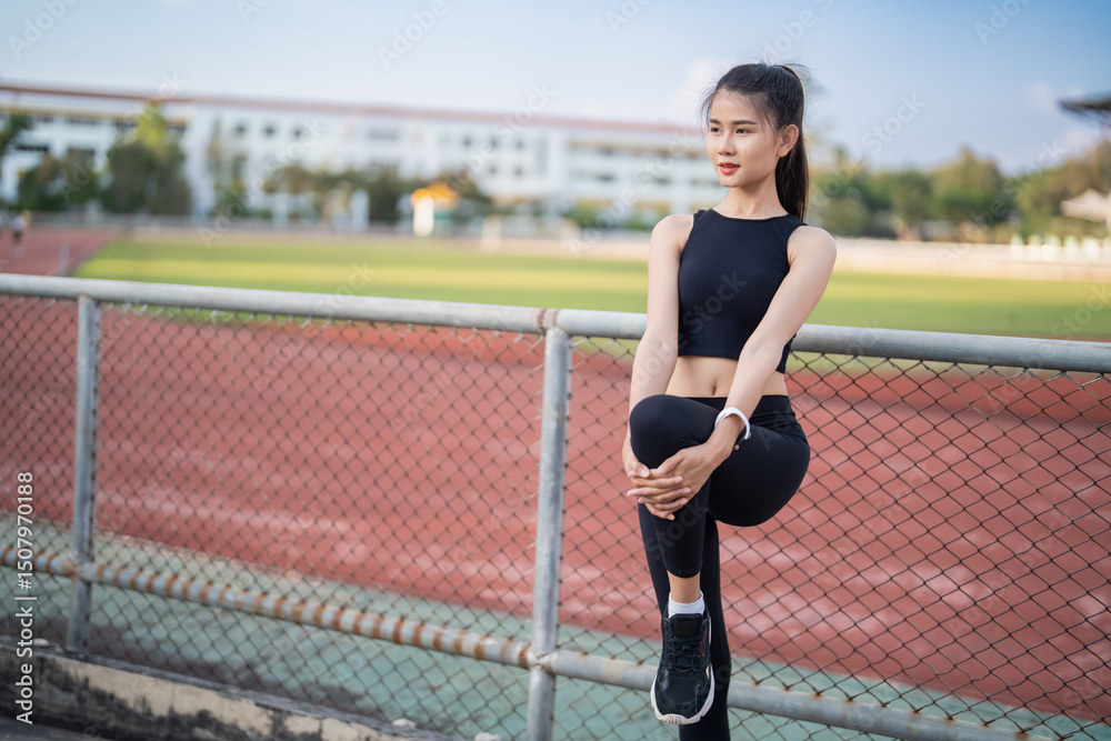 Obraz premium Active healthy asian woman exercising by running, jogging runner sports stadium during the morning healthcare and well being concept