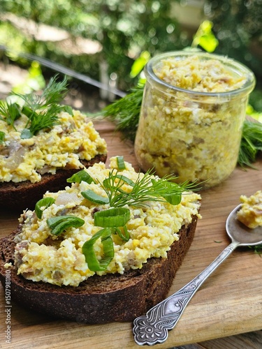 Forshmak. Sandwiches on a wooden background