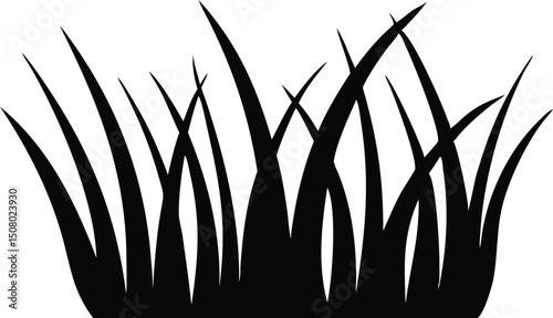 Black silhouette of grass blades forms an isolated patch on white field