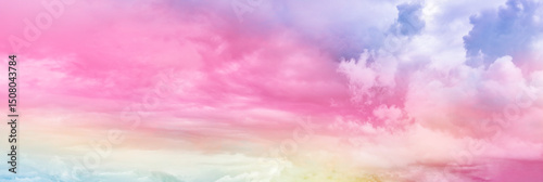 Sunset sky in the morning with sunrise and soft pink clouds with yellow tones, happy day, background