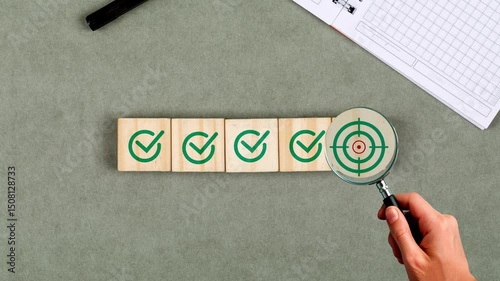 Business strategy planning and quality management concept. Magnifying glass focuses on target icon and arrow with check marks. business goal setting, strategy planning, quality management processes, v