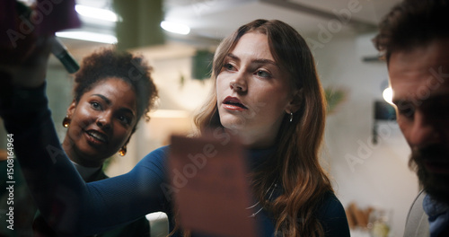 Tableau sur toile Brainstorming, team and writing of ideas, office and colleagues with marketing strategy, planning and night