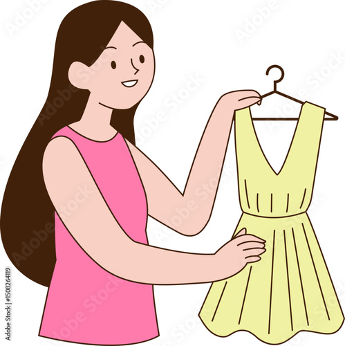 Femme tenant une robe sur un cintre