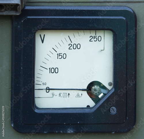 Close-up of an analog voltmeter showing voltage value
