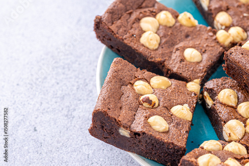 Homemade chocolate brownie photography . Top view on rustic background.Rich chocolate brownie , showcasing its dense texture and glossy surface, professional food photography.