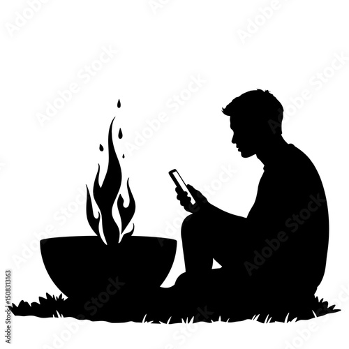 Silhouette of Person with Phone by Fire Pit at Night