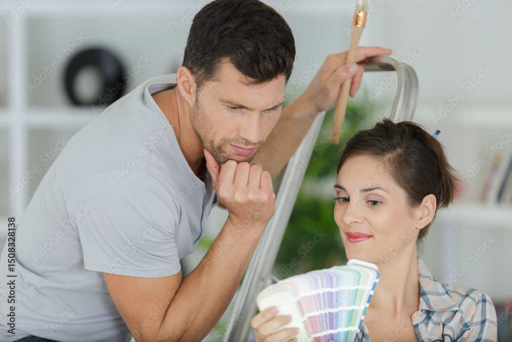 Fototapeta premium young family planning home refurbishing