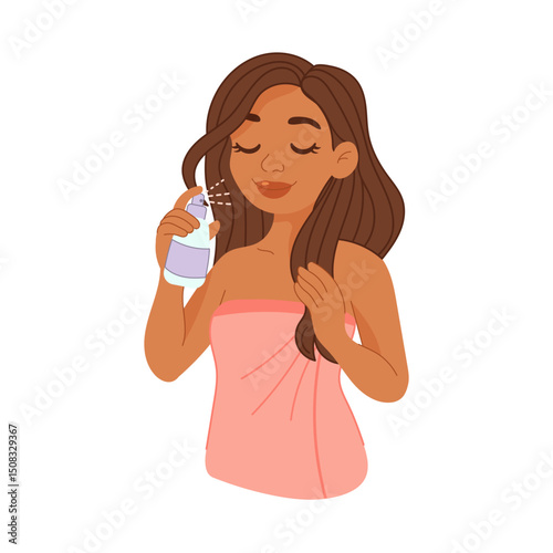 Black woman applying hair spray during beauty routine
