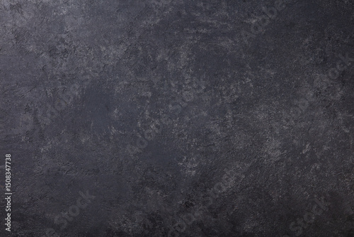 Natural black slate stone background pattern with high resolution. Top view. Copy space.