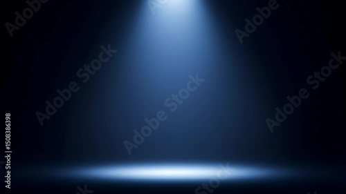 Wallpaper Mural Single blue spotlight shining down onto a dark stage or floor, creating a focused, dramatic effect. Torontodigital.ca