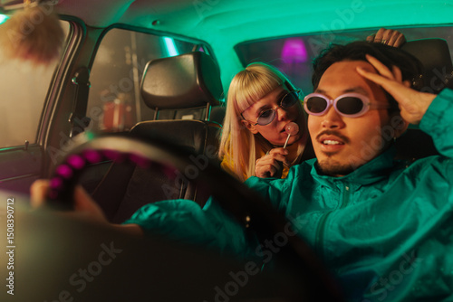 Flirty couple in car.