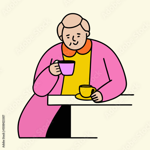 Elderly woman sitting at table drinking tea or coffee, relaxed in pink cardigan and yellow top, enjoying quiet moment with warm beverage in simple indoor setting