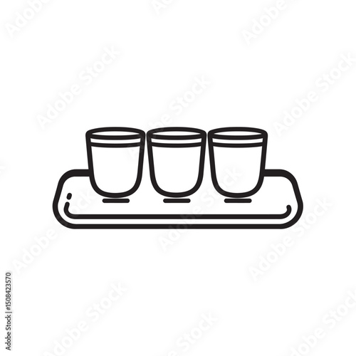 Three black outline glasses arranged neatly on a small tray give a minimal feeling