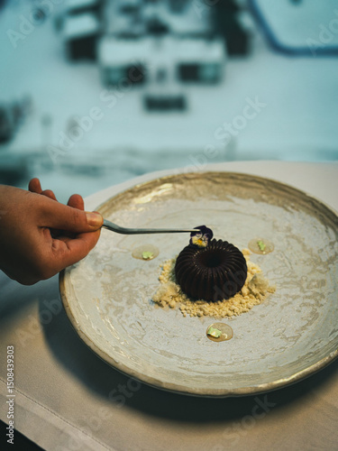 final decoration of the chocolate cake on the plate