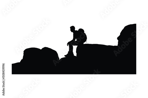 Silhouette of a Hiker Resting on Rocks Contemplating the View