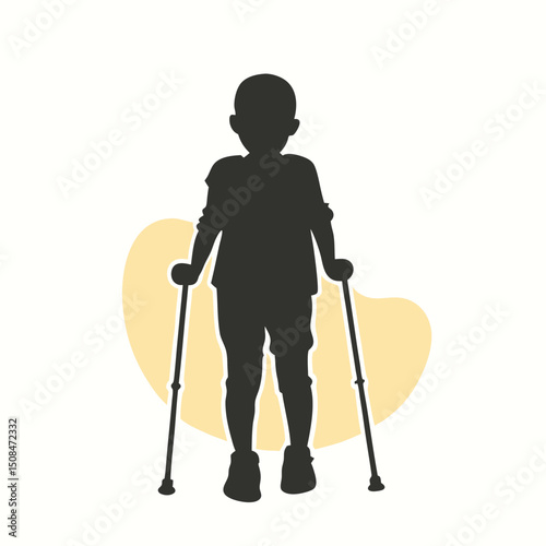 Young boy walking with crutches silhouette.