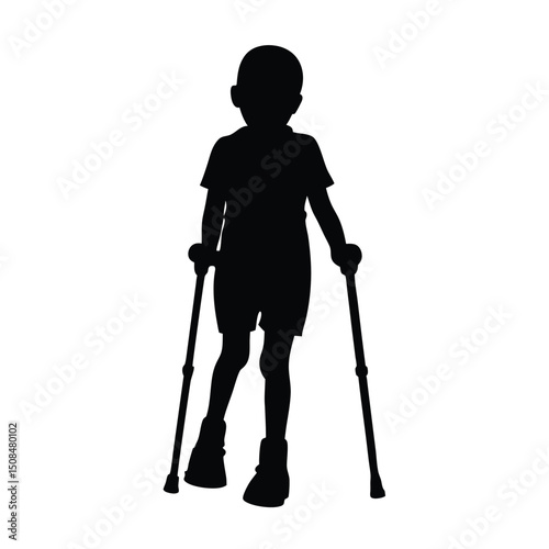 Young boy walking with crutches silhouette.